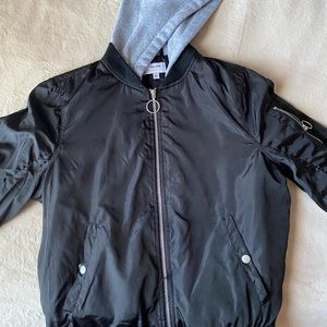 Stylish black puffer jacket.